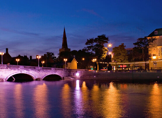 Bridge Crossing a River at Night
