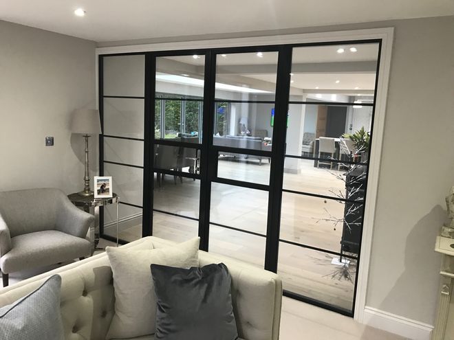 Interior Glass Doors Separating Living Room and Dining Room