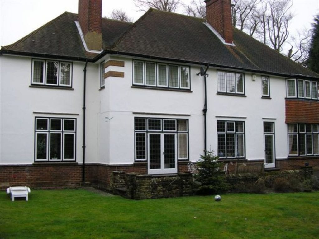 Exterior of Large Traditional White Home