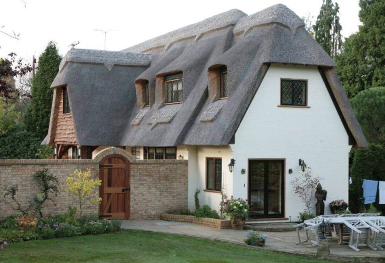 White Cottage With Thatched Roof