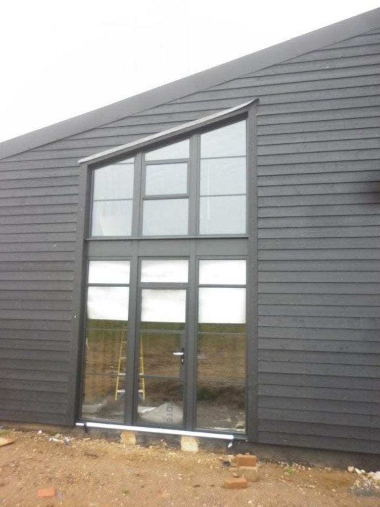 Grey Building With Grey Slanted Windows